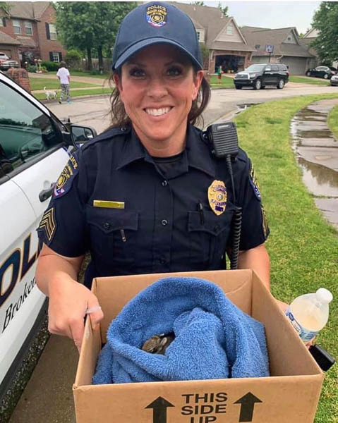 Officer with rescued rabbit