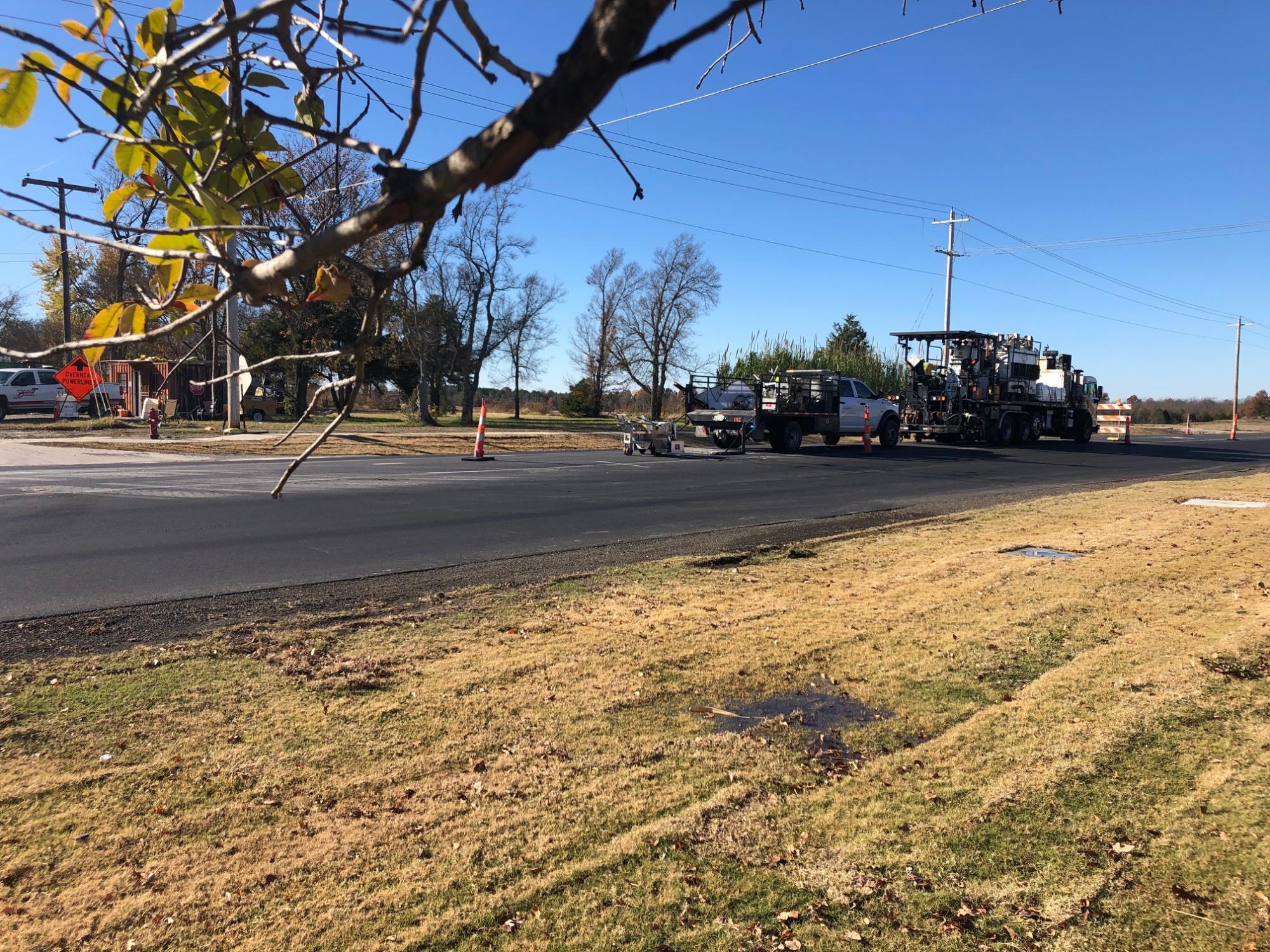 Crews prepare to stripe the lines on the New Orleans St. pavement