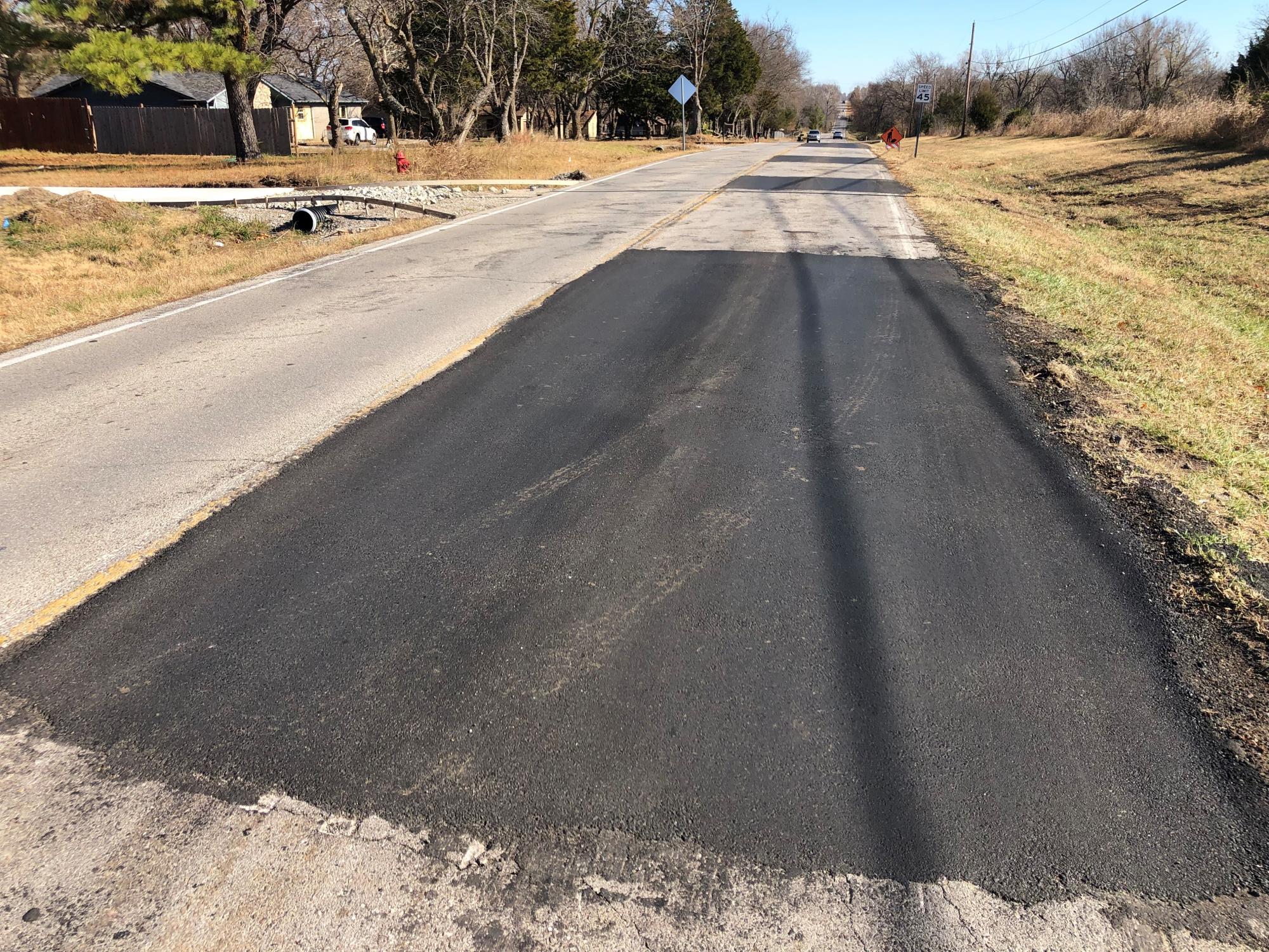 Resurfacing work on 81st near Evans