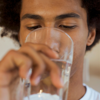 man drinking water